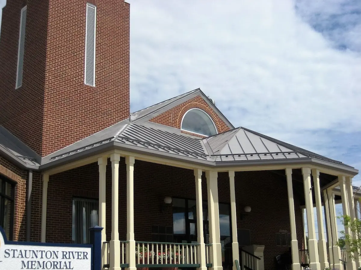 Skilled roofing craftsmen working on a residential roof in Cherryville